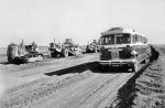 Brill Bus Next to Earthmoving Equipment