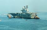 HMS Eagle departs